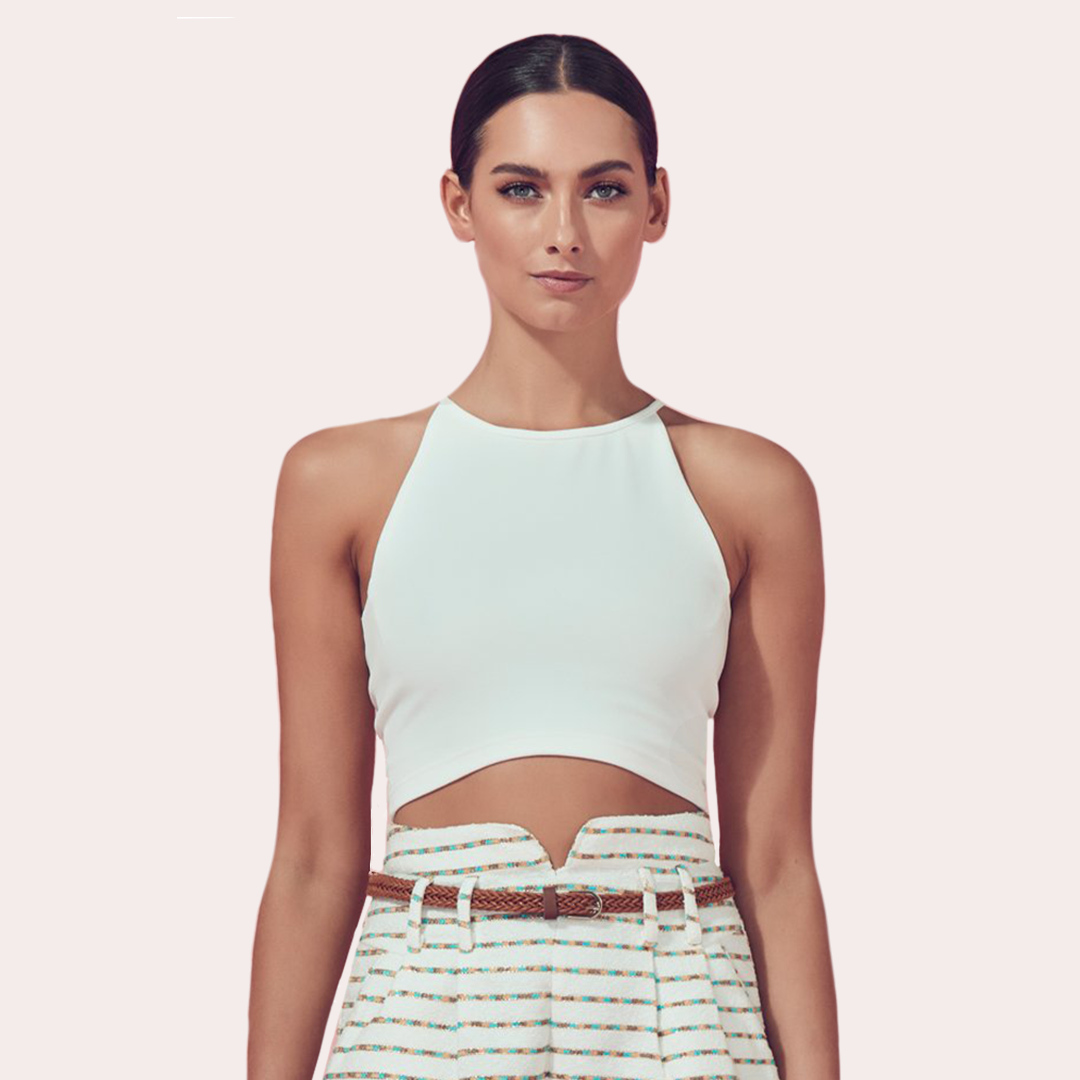 Matea Designs female fashion model wearing ivory strappy crop top