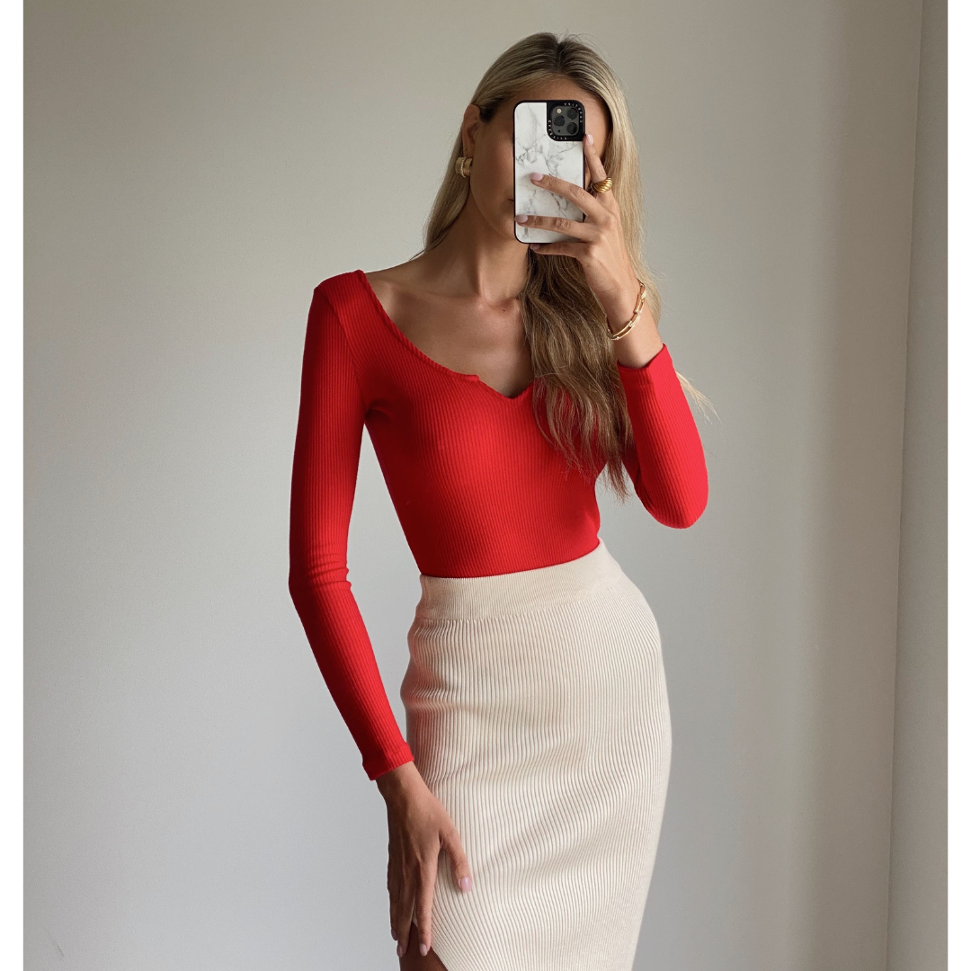 Female model wearing long sleeve knit bodycon bodysuit online