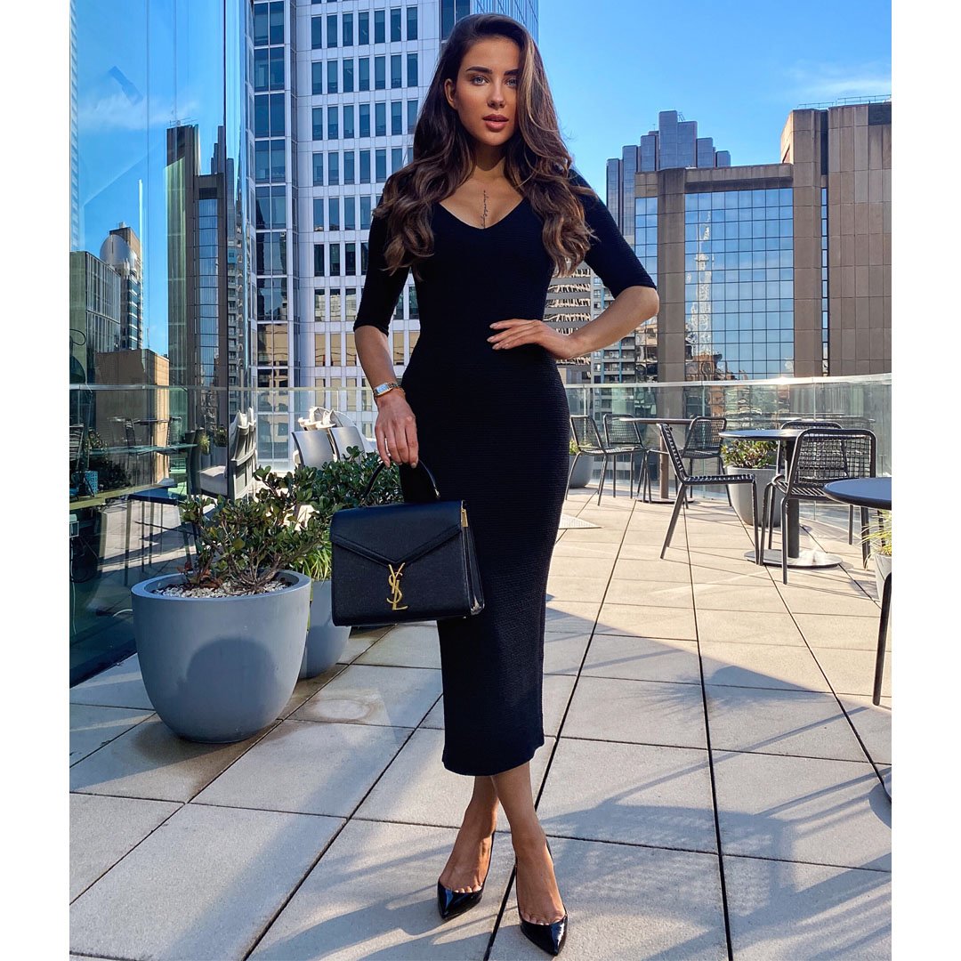 Women fashion model wearing designer black bodycon midi dress online