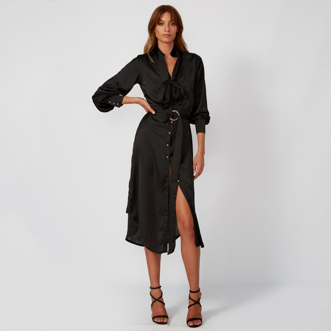 Female model wearing women's fashion black midi shirt dress