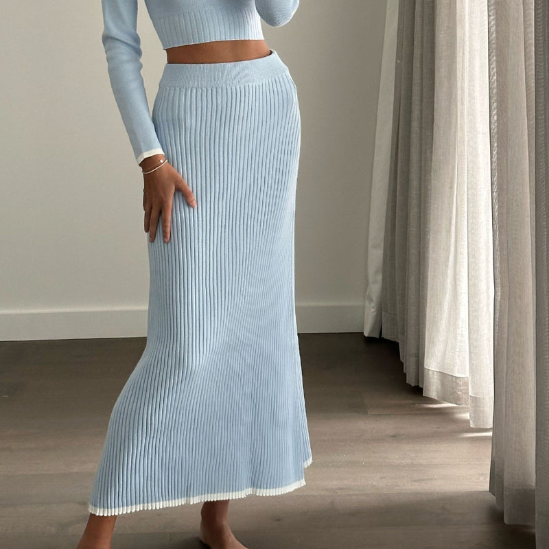 Female model online wearing baby blue knit high waist pleated maxi skirt 