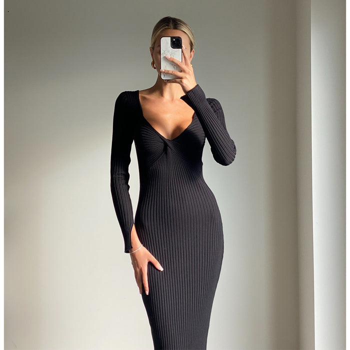 Female model online wearing black long sleeve midi dress
