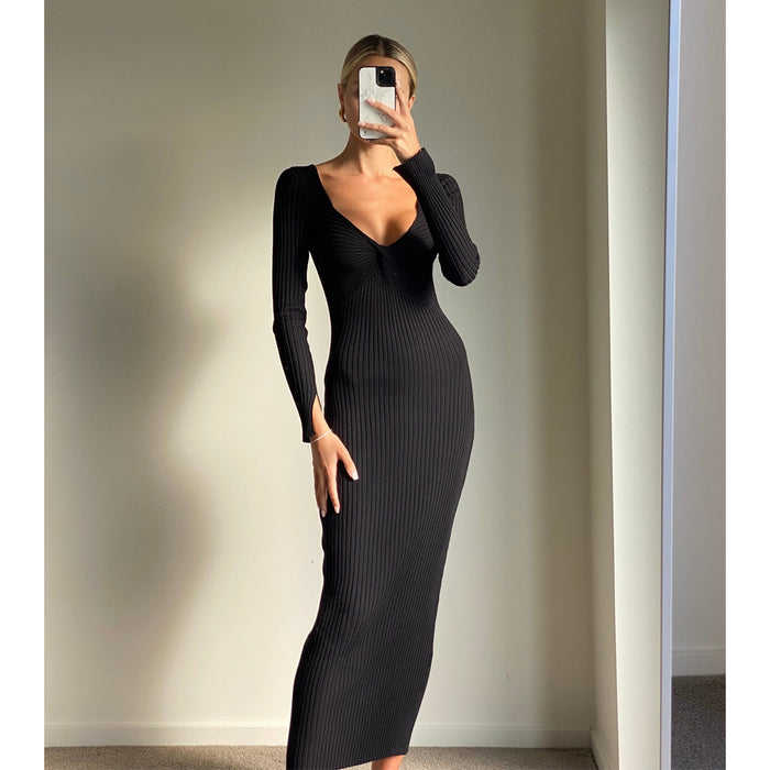 Female model online wearing black long sleeve midi dress