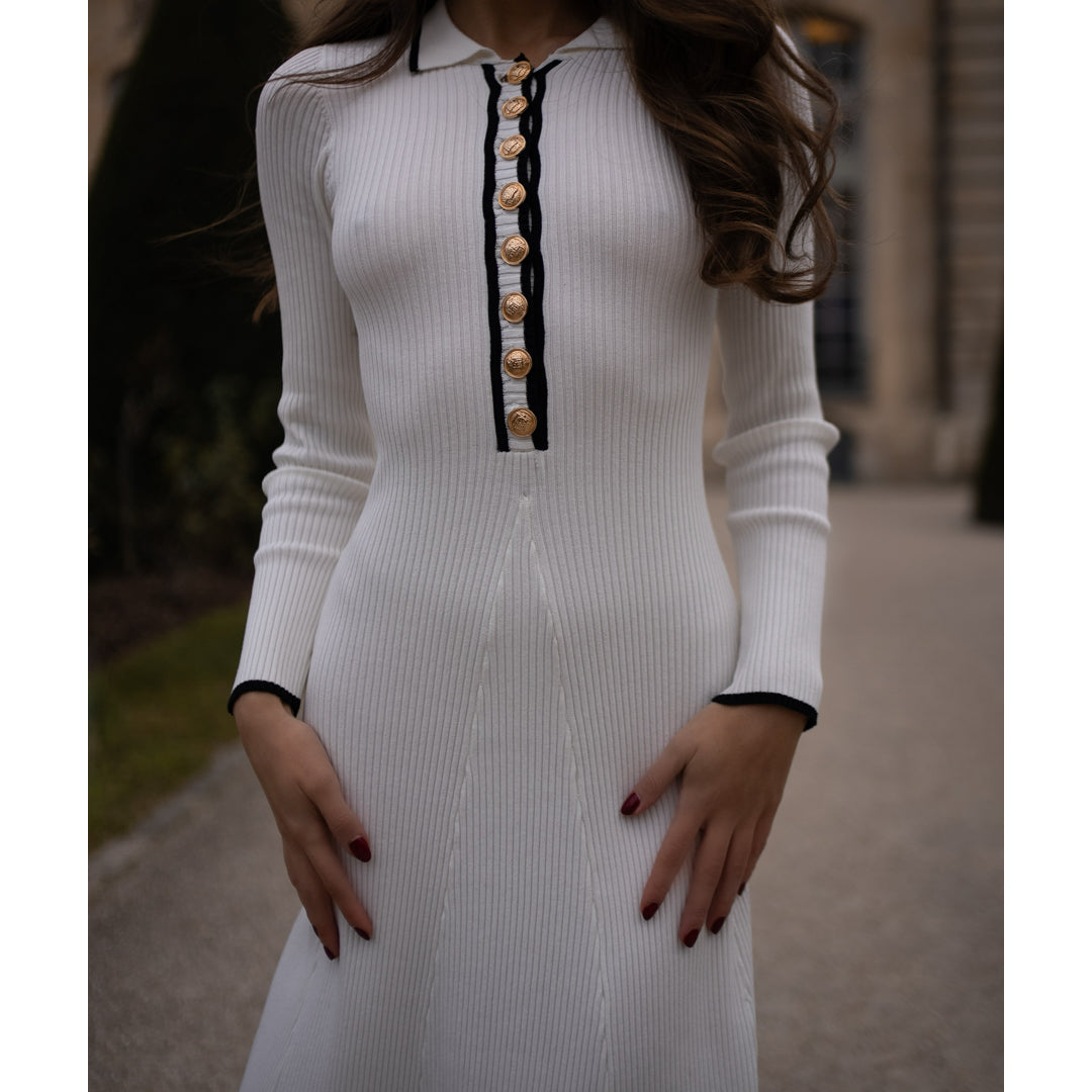 Female model wearing ivory knit long sleeve midi dress