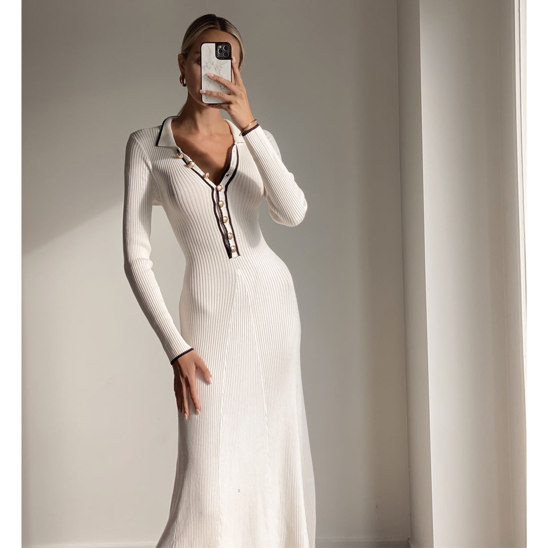 Female model wearing ivory knit long sleeve midi dress