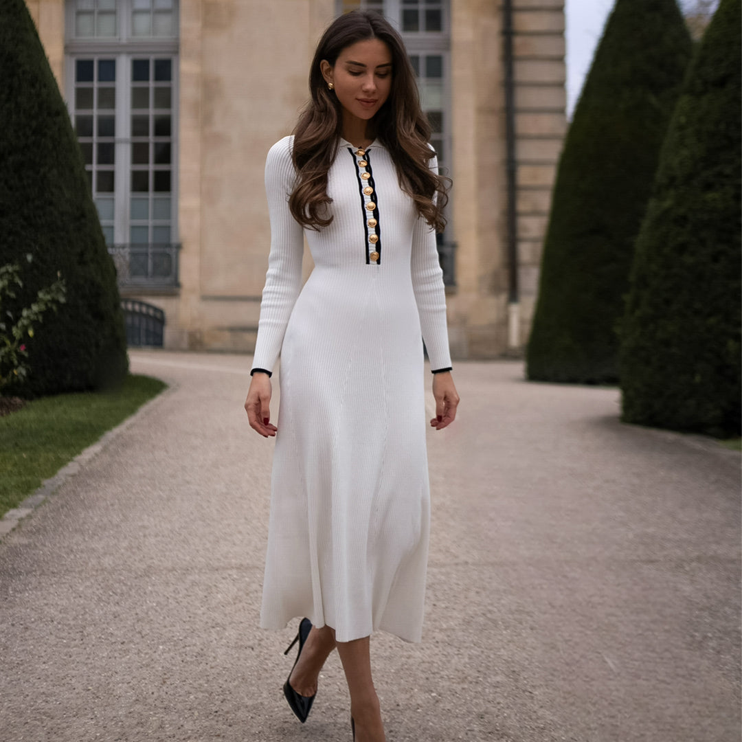 Female model wearing ivory knit long sleeve midi dress