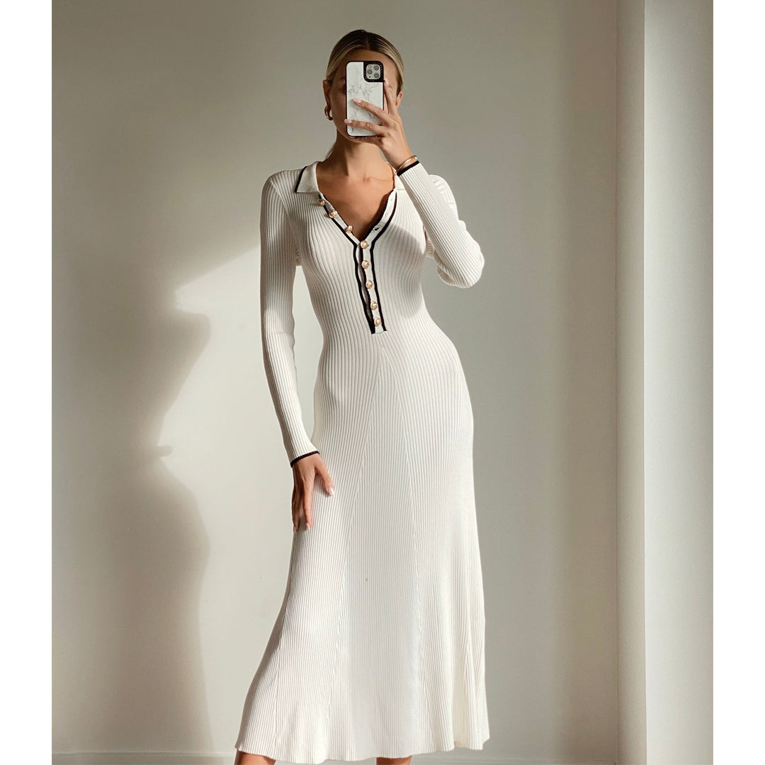 Female model wearing ivory knit long sleeve midi dress