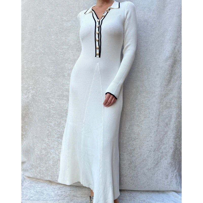 Female model wearing ivory knit long sleeve midi dress
