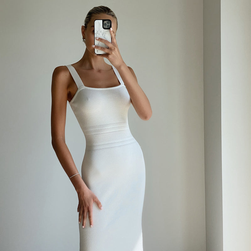 Female model wearing ivory strappy knit midi dress online