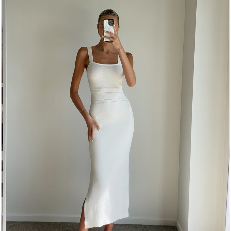 Female model wearing ivory strappy knit midi dress online