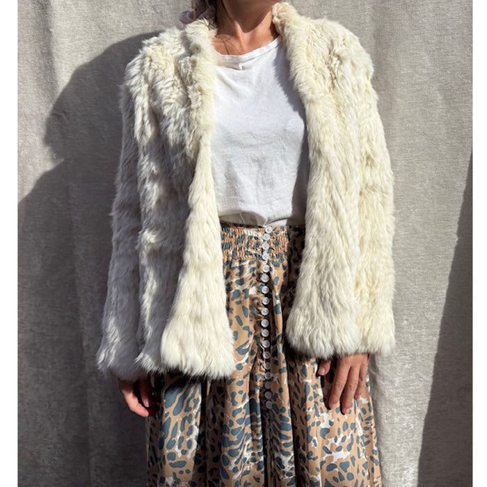 Female model wearing ivory white fur jacket online