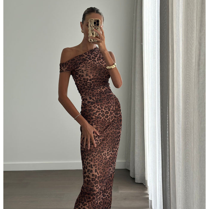 Female model wearing off shoulder fitted leopard print midi dress online 