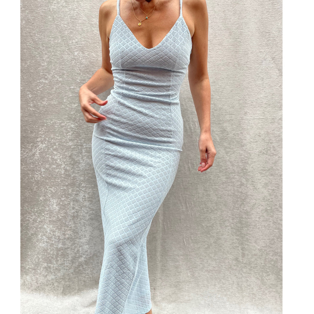 Female model wearing light blue texture bodycon strappy midi dress online