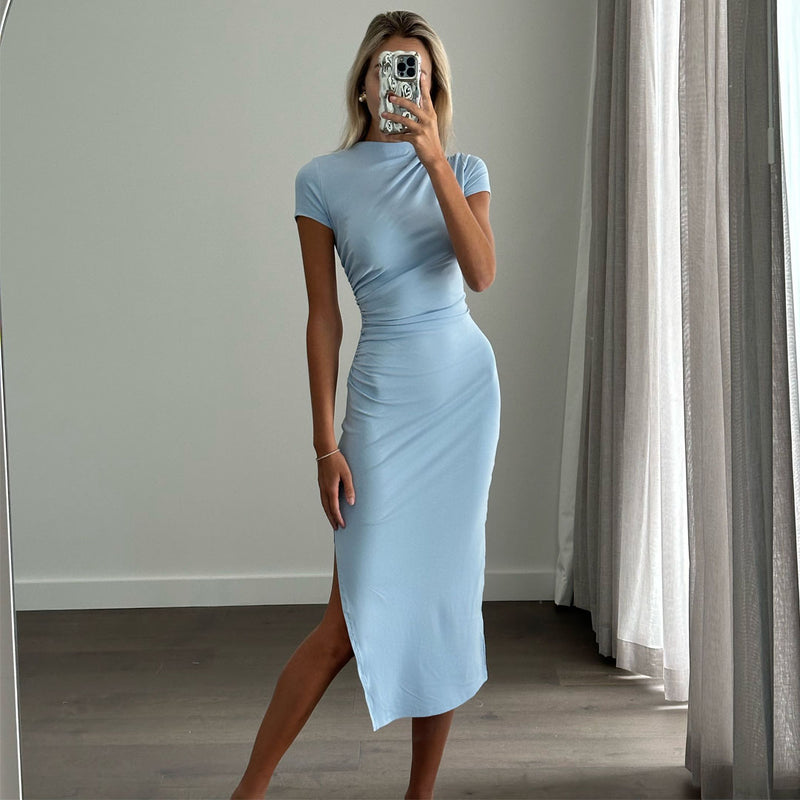 Female model wearing baby blue crew neck short sleeve fitted midi dress
