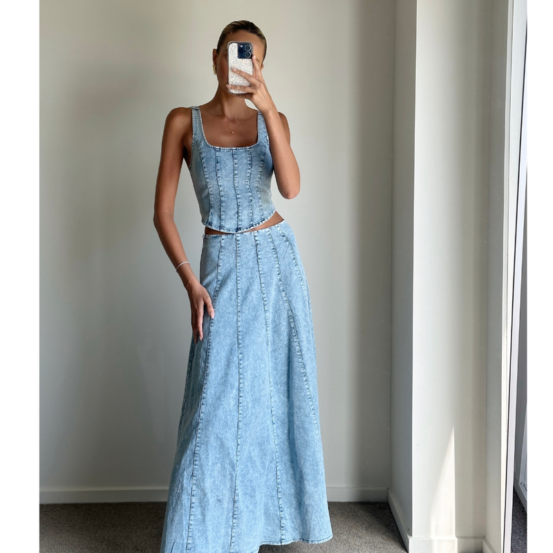 Model wearing light denim mid waist maxi skirt online