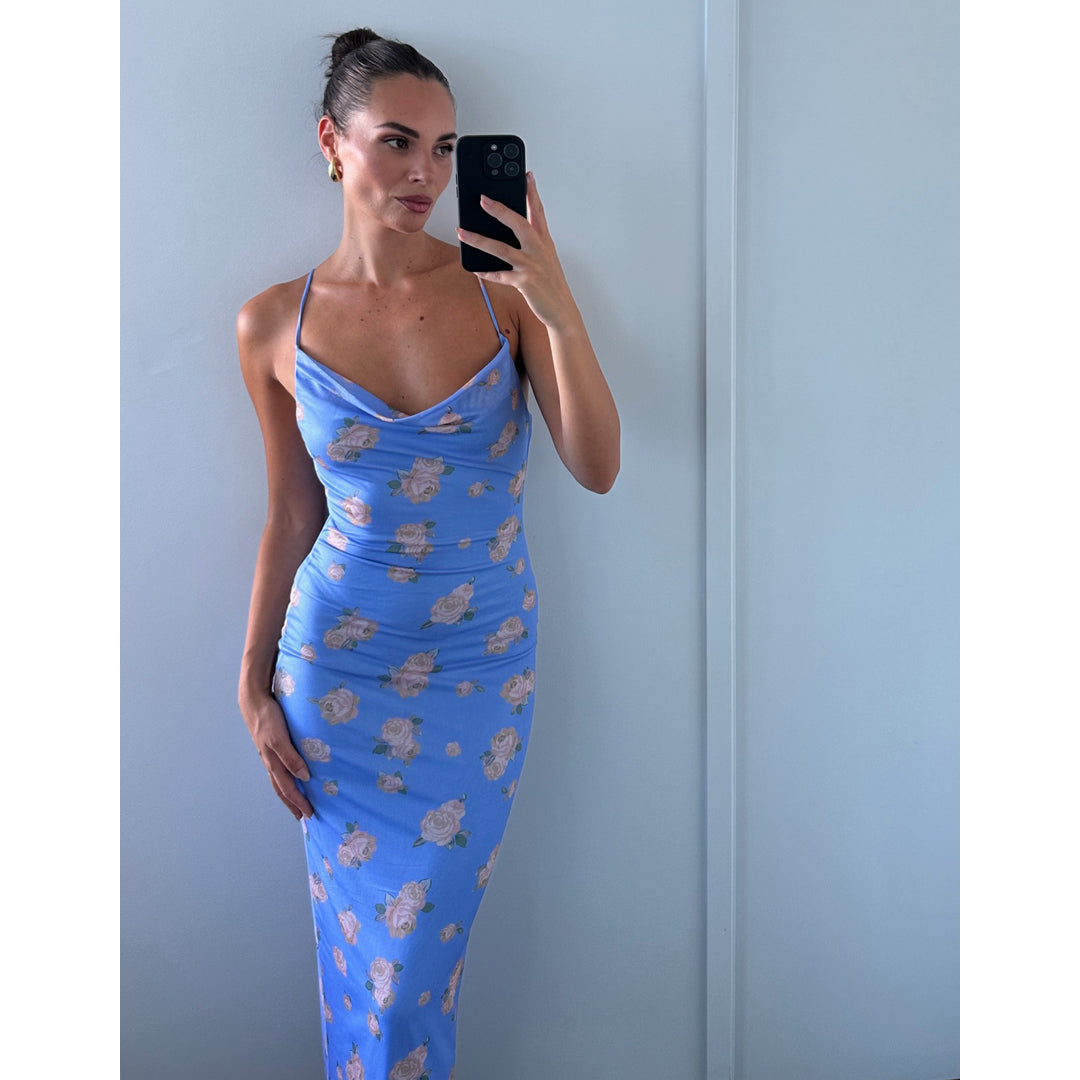 Female model wearing lilac flower print bodycon midi dress online