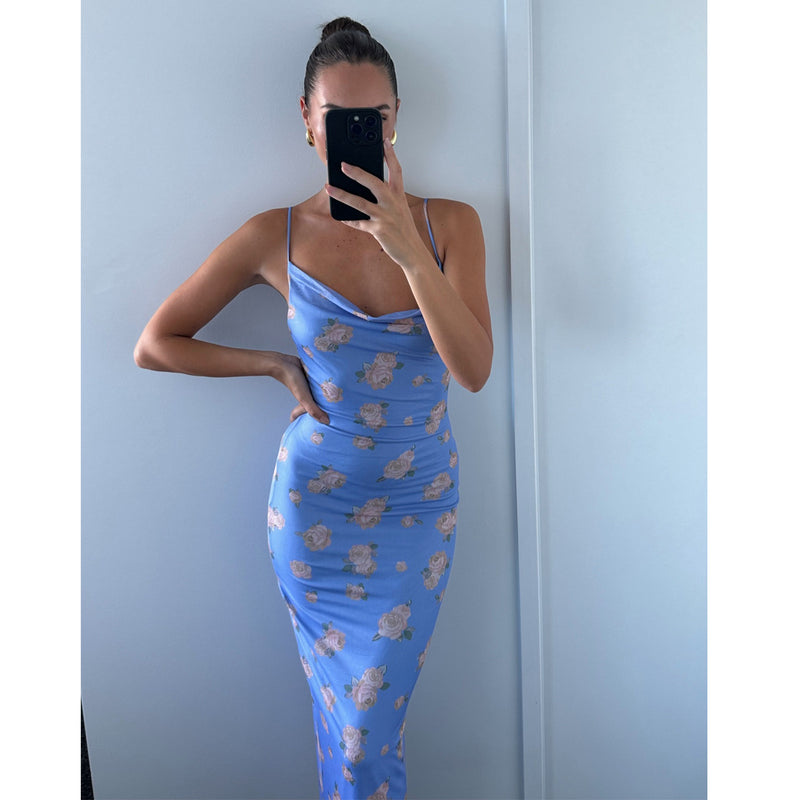 Female model wearing lilac flower print bodycon midi dress online