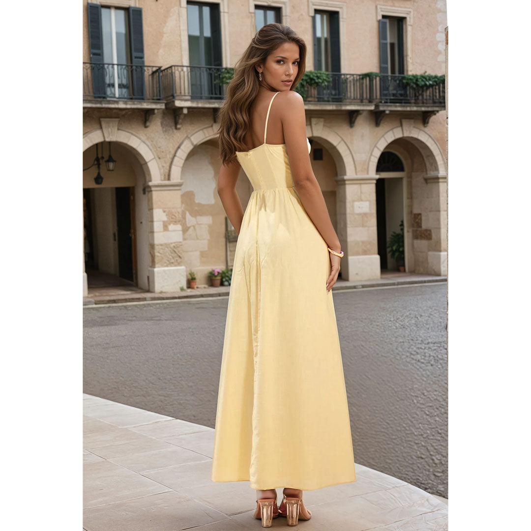 Female model wearing soft yellow v neck maxi dress online 