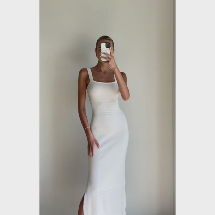Female model wearing ivory strappy knit midi dress online