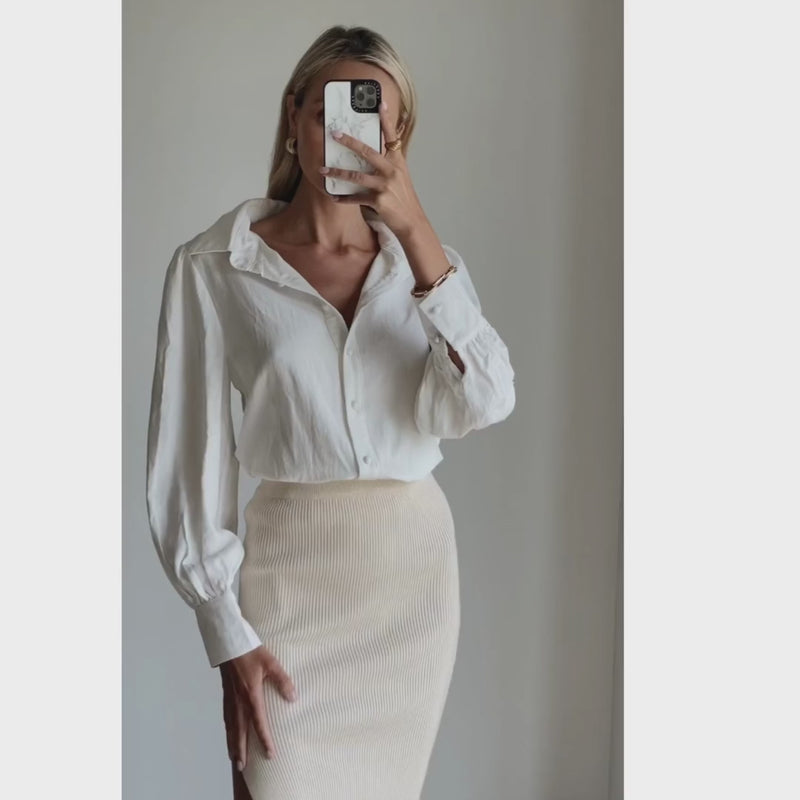Fashion model wearing womens designer ivory shirt online