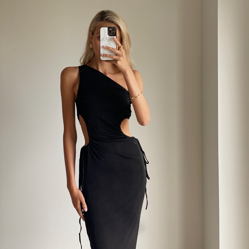 Female model online wearing black one shoulder side cut out maxi dress