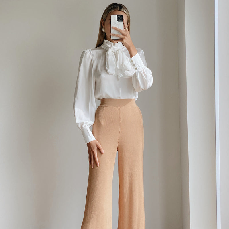 Female model wearing camel high waist knit pants online