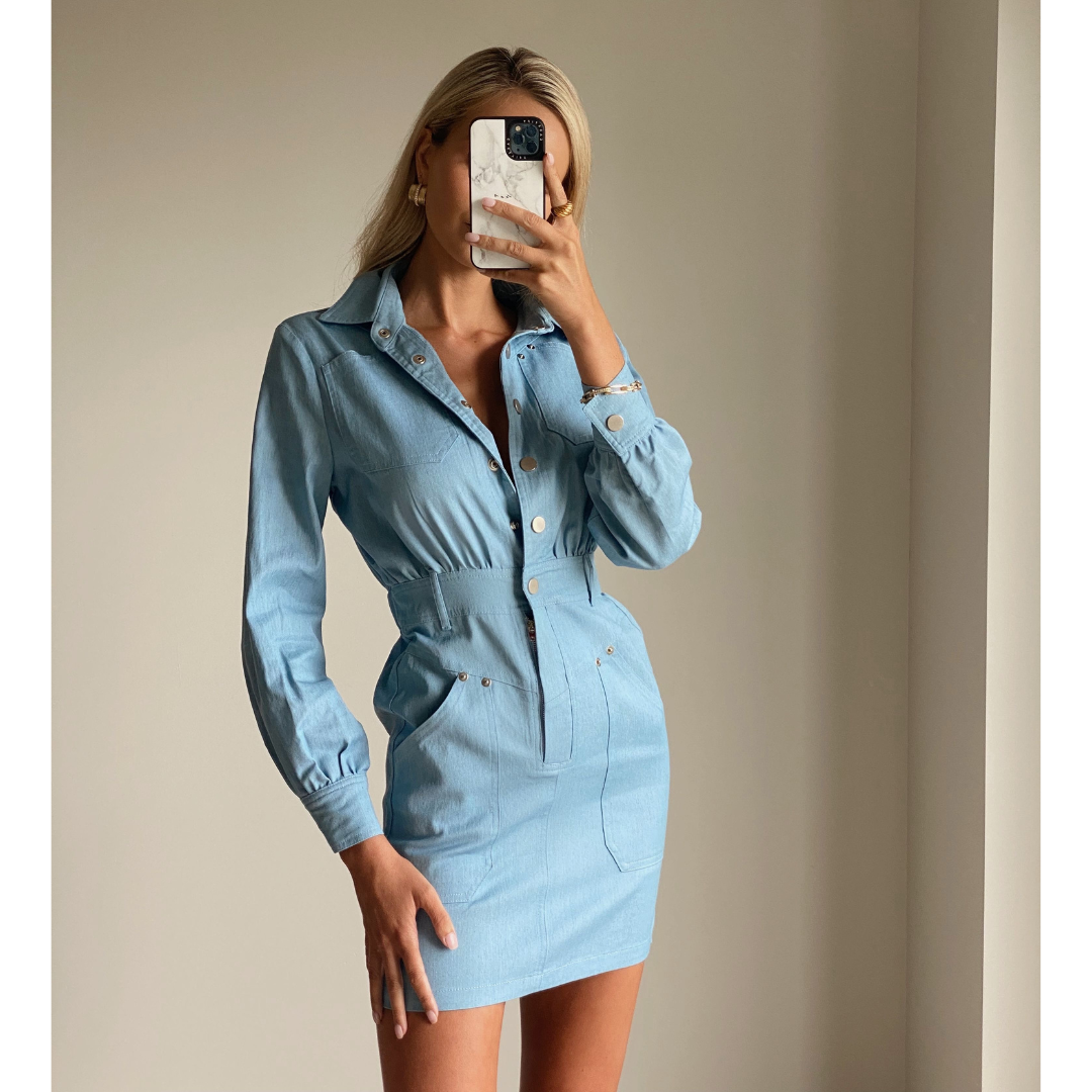 Female model online wearing long sleeve light denim mini dress