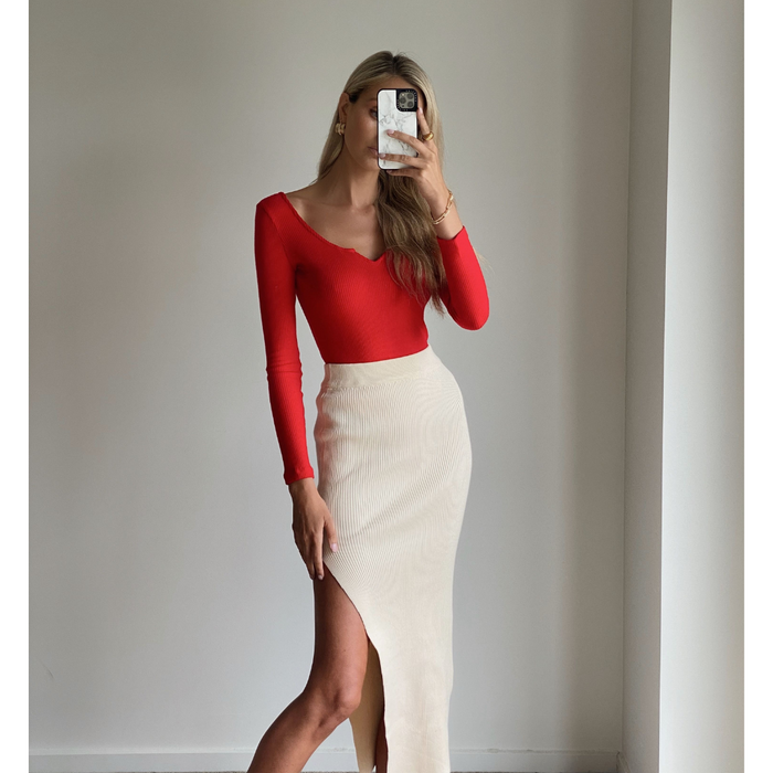Female model wearing long sleeve knit bodycon bodysuit online