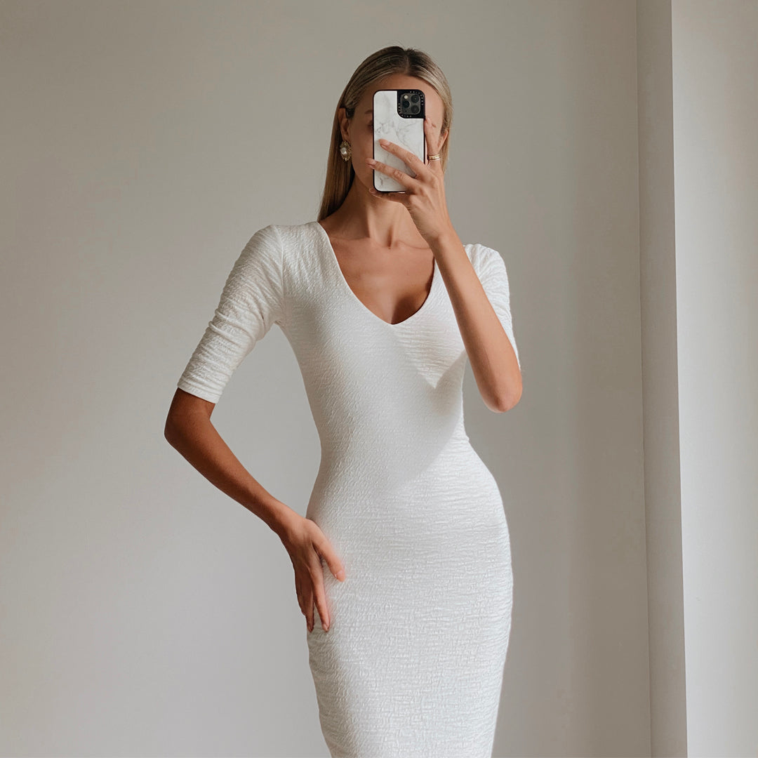 Fashion model wearing womens white bodycon midi dress online