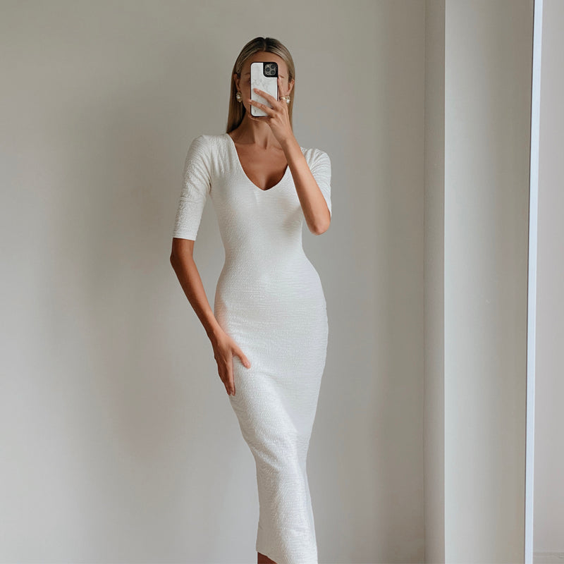Fashion model wearing womens white bodycon midi dress online