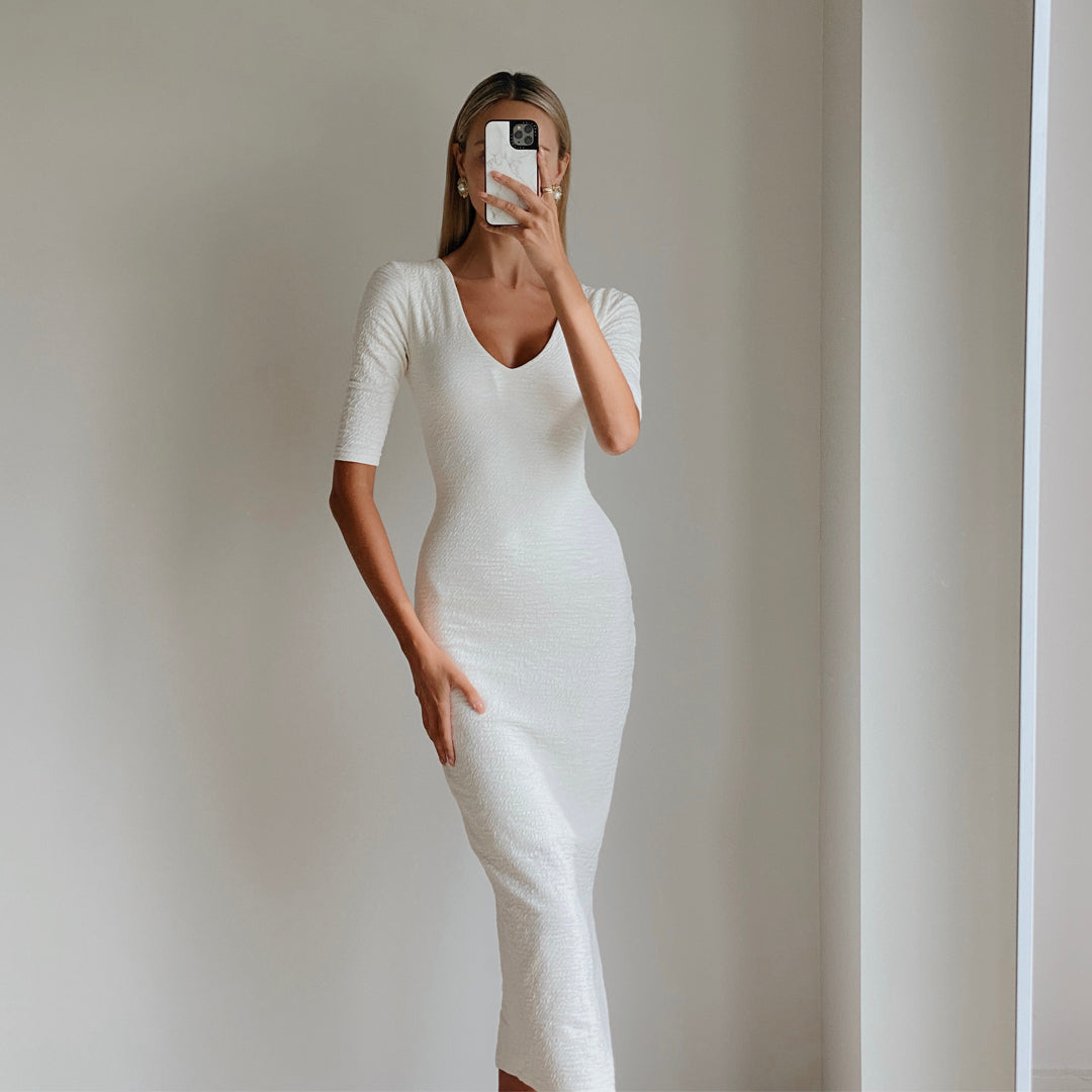 Fashion model wearing womens white bodycon midi dress online