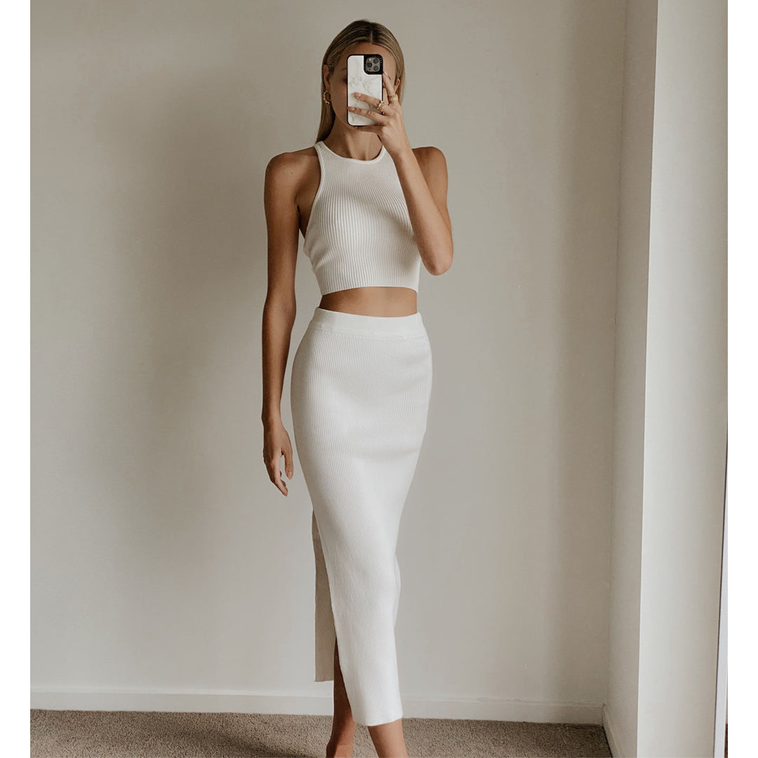 Female model wearing white knit high waist bodycon midi skirt online