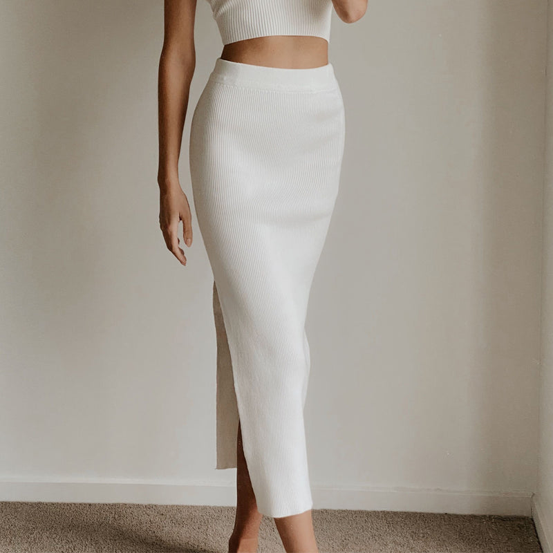 Female model wearing white knit high waist bodycon midi skirt online