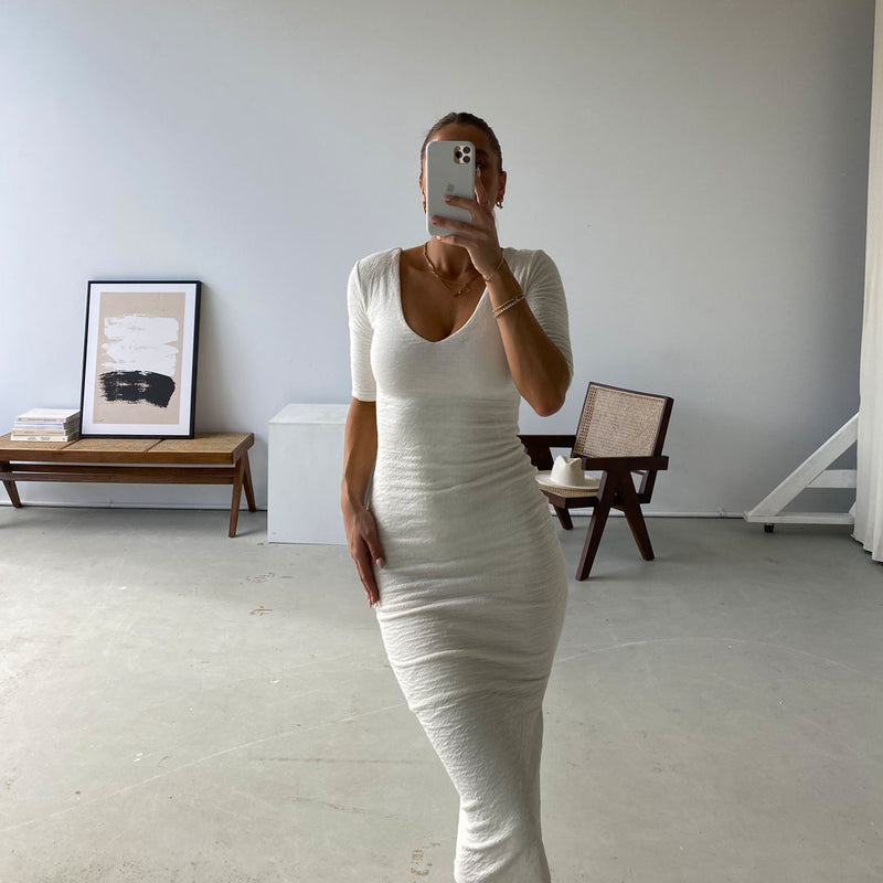 Fashion model wearing womens white bodycon midi dress online
