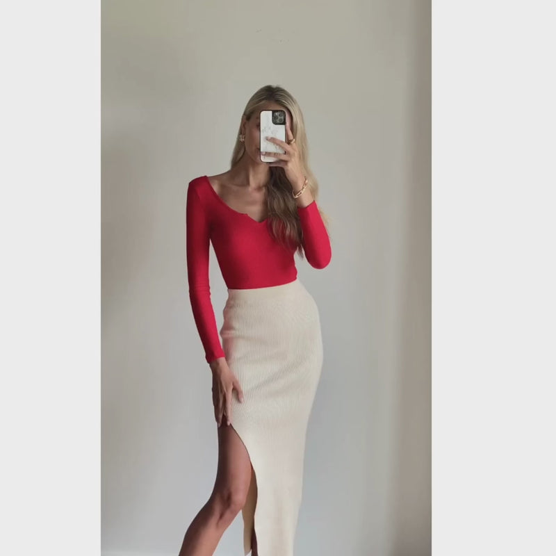 Female model wearing long sleeve knit bodycon bodysuit online