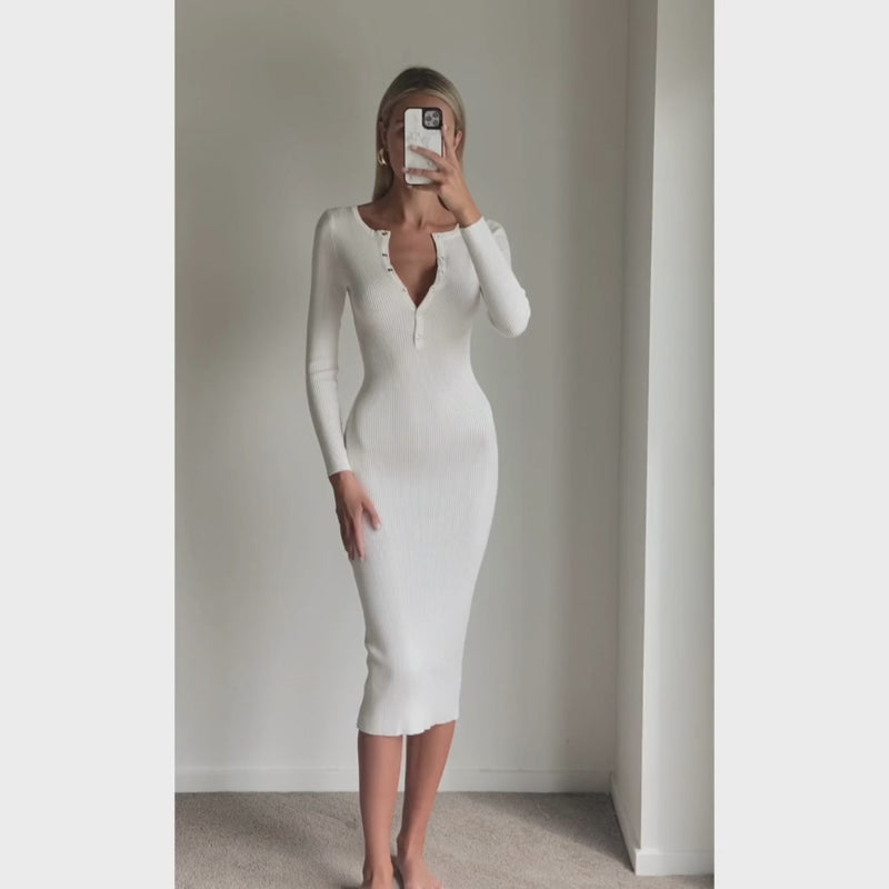 Female model wearing white knit bodycon midi dress